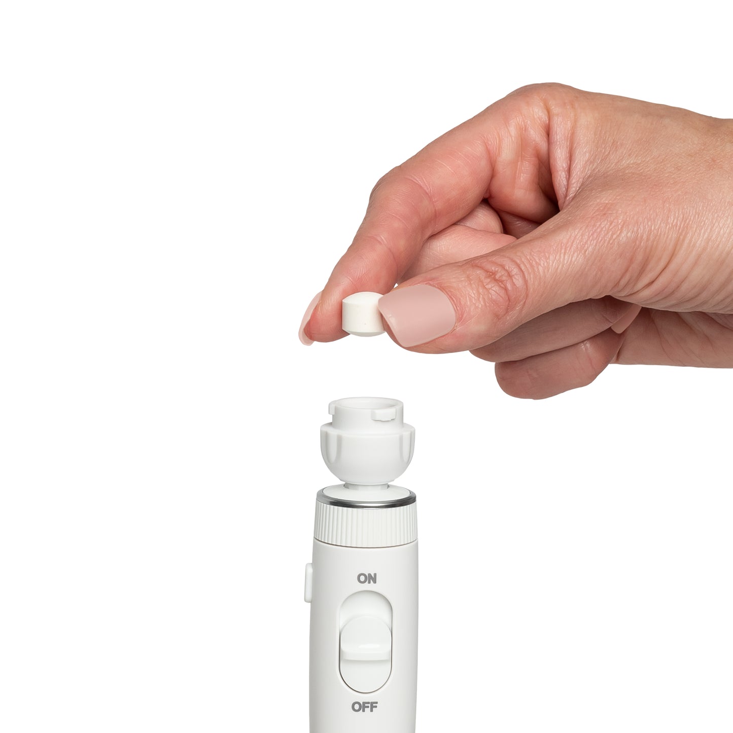 Adding Whitening Tablet into Boost Tip on Waterpik Countertop Water Flosser Handle