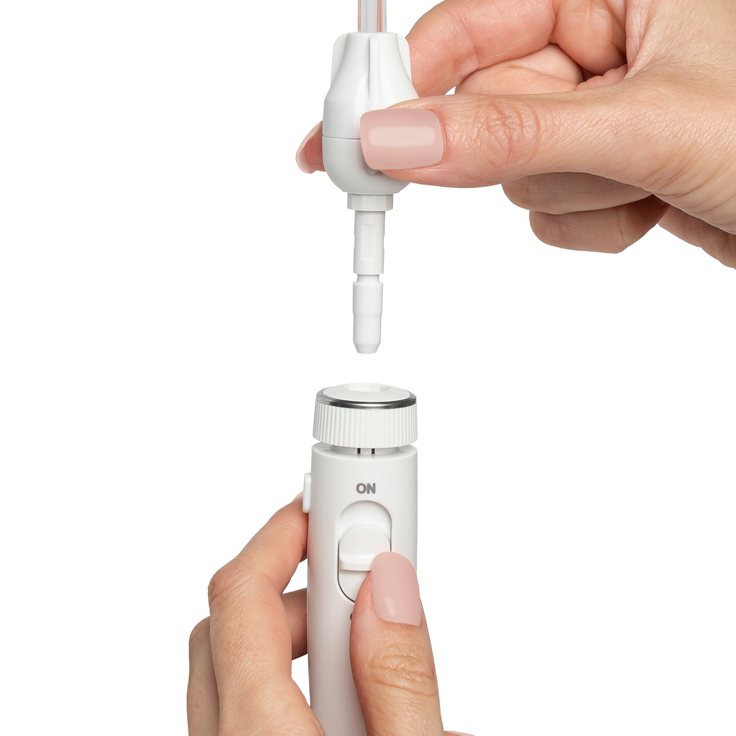 Inserting Boost Tip into Waterpik Countertop Water Flosser Handle