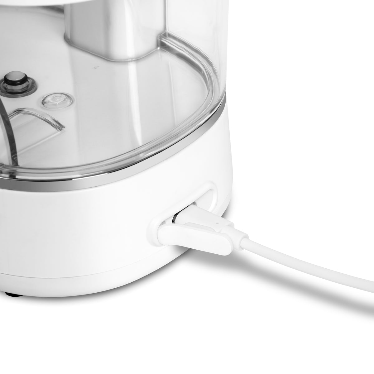 Charging port on the base of the white ION countertop water flosser.