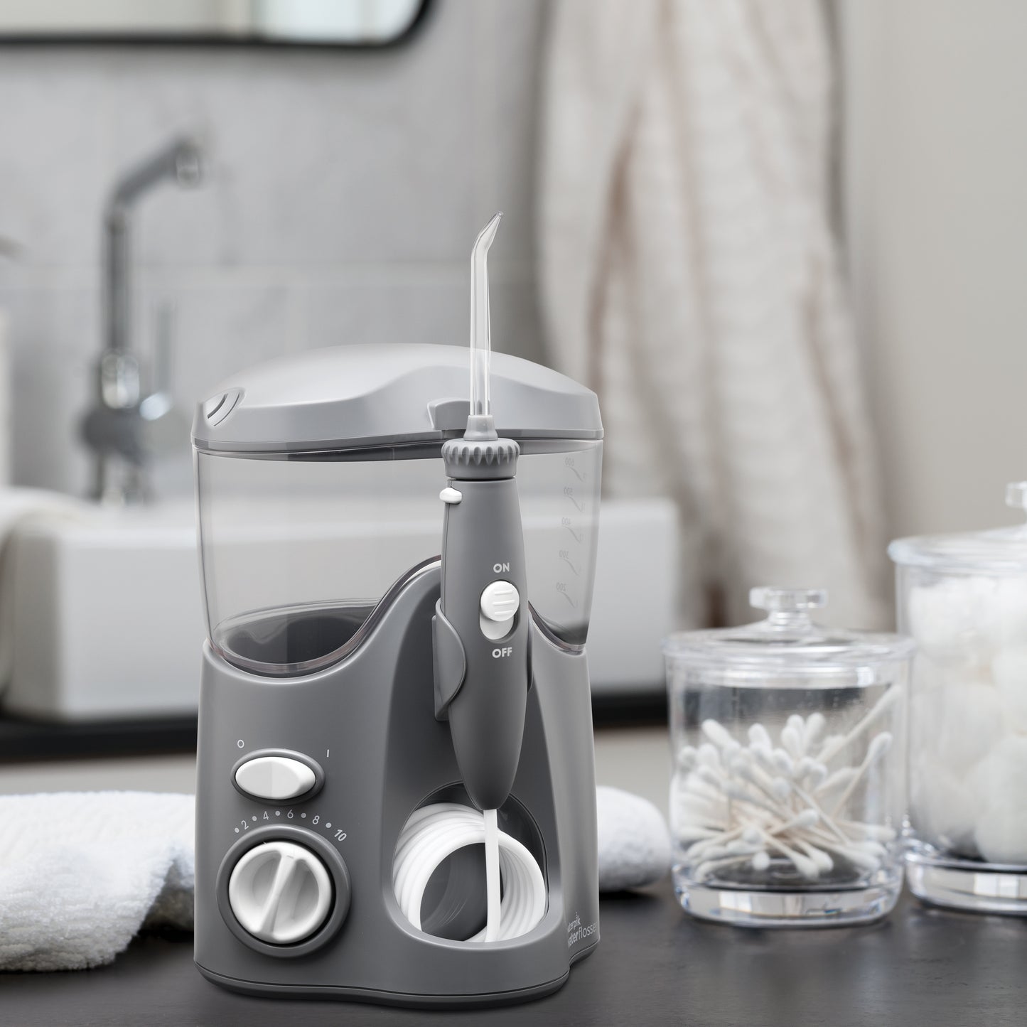 Gray Ultra Water Flosser WP-117 In Bathroom