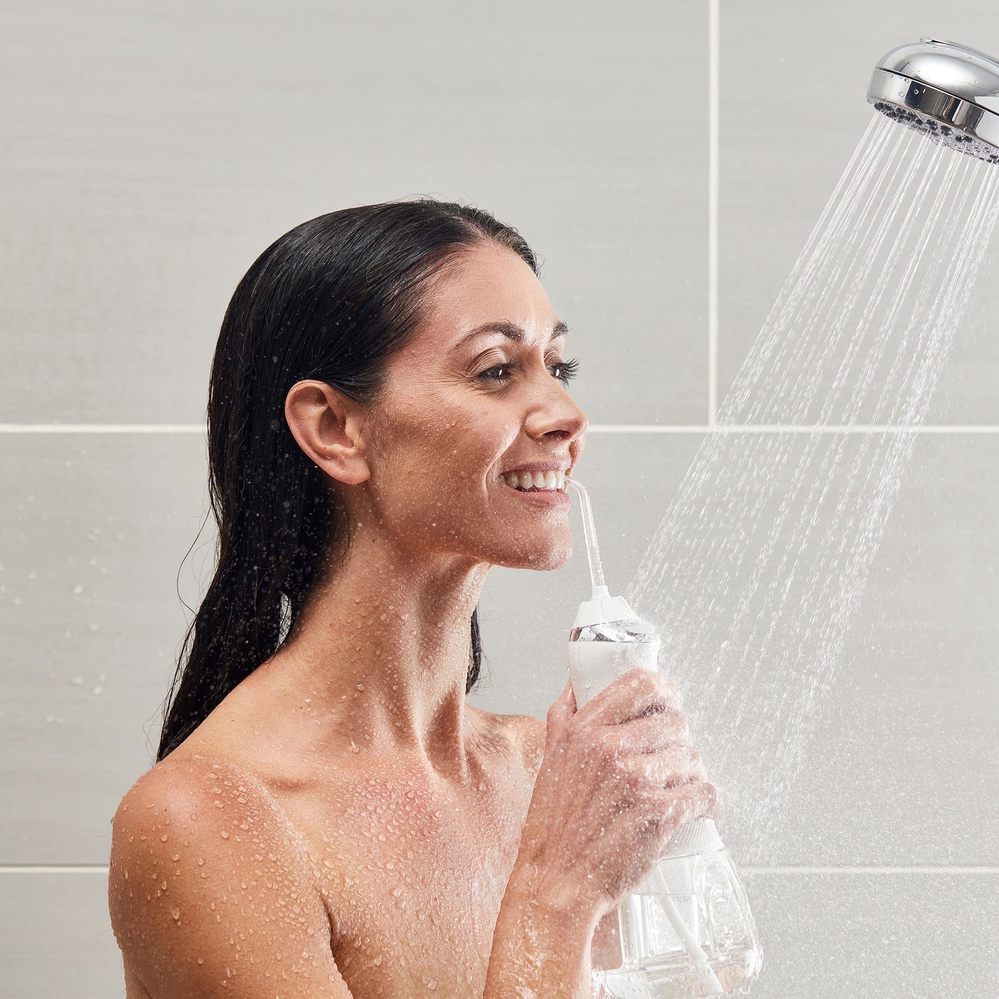 Using White Cordless Advanced Water Flosser WP-580 in the Shower