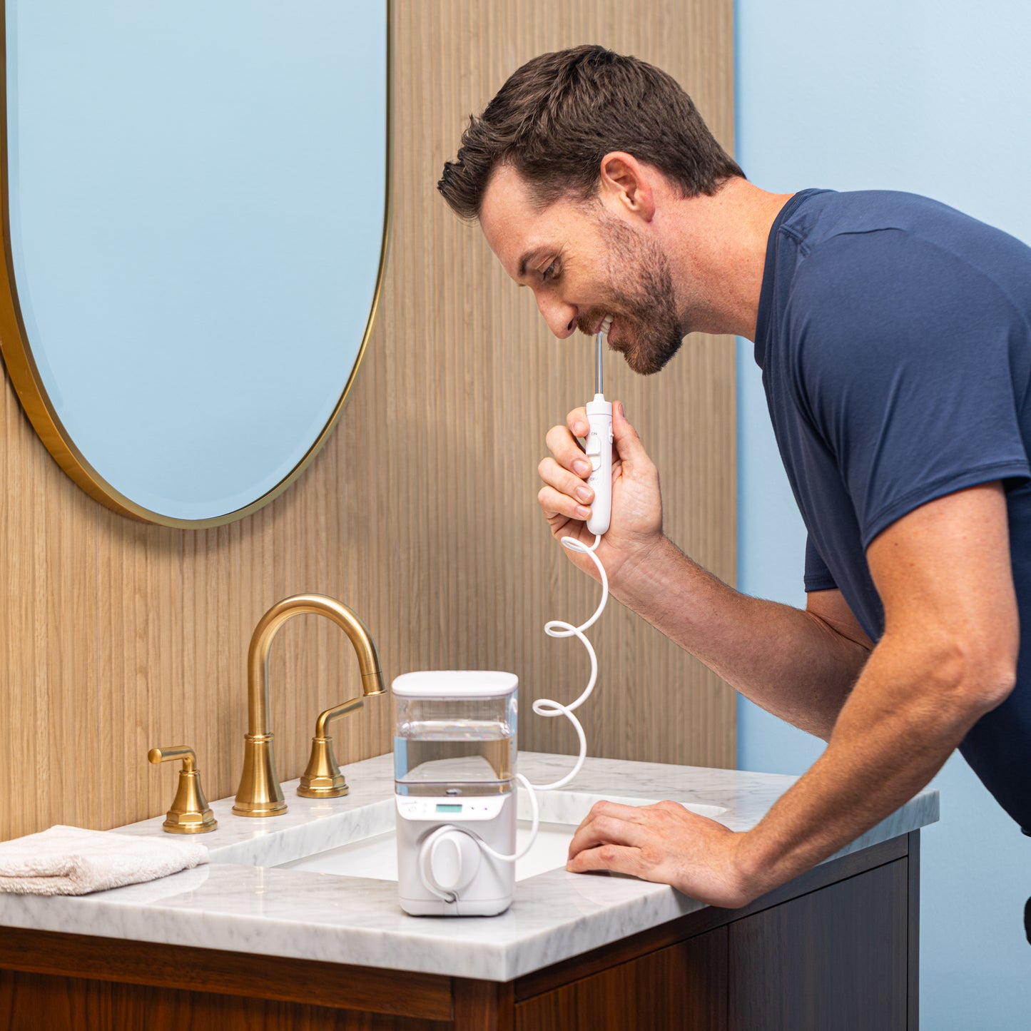 Using White PROMAX Water Flosser WF-23