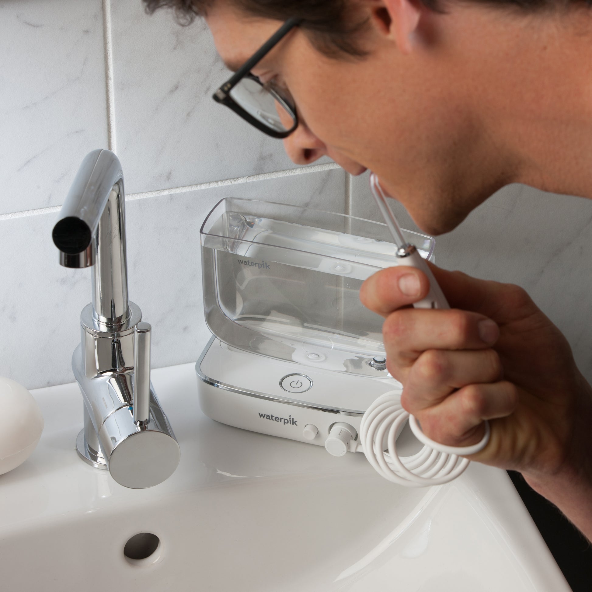 Using WF-04 White Sidekick Water Flosser